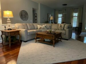 Living room area rug flooring | Battle Creek Tile & Mosaic